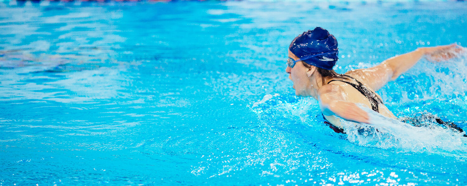 woman swimming laps 