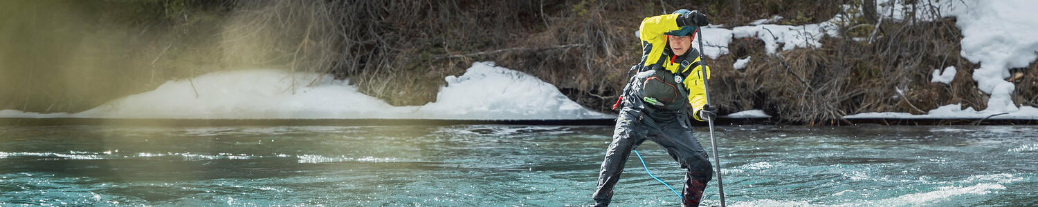 Person Stand up paddling 