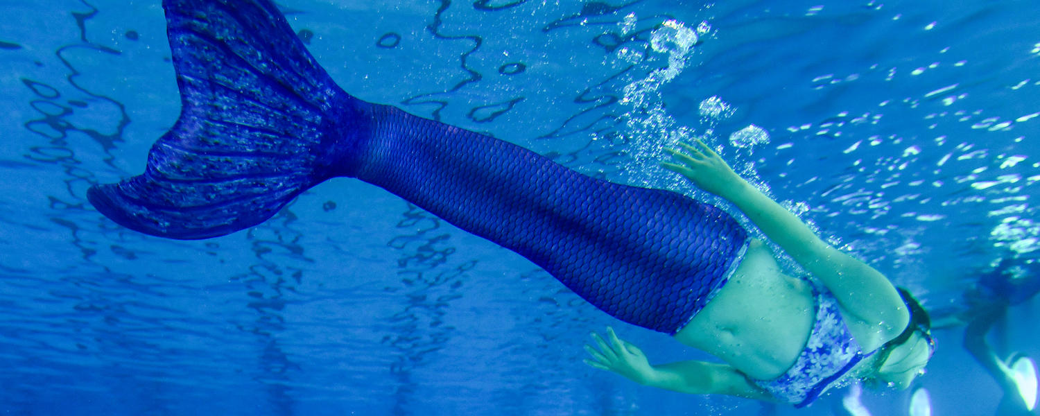 Swimming pool mermaid camp