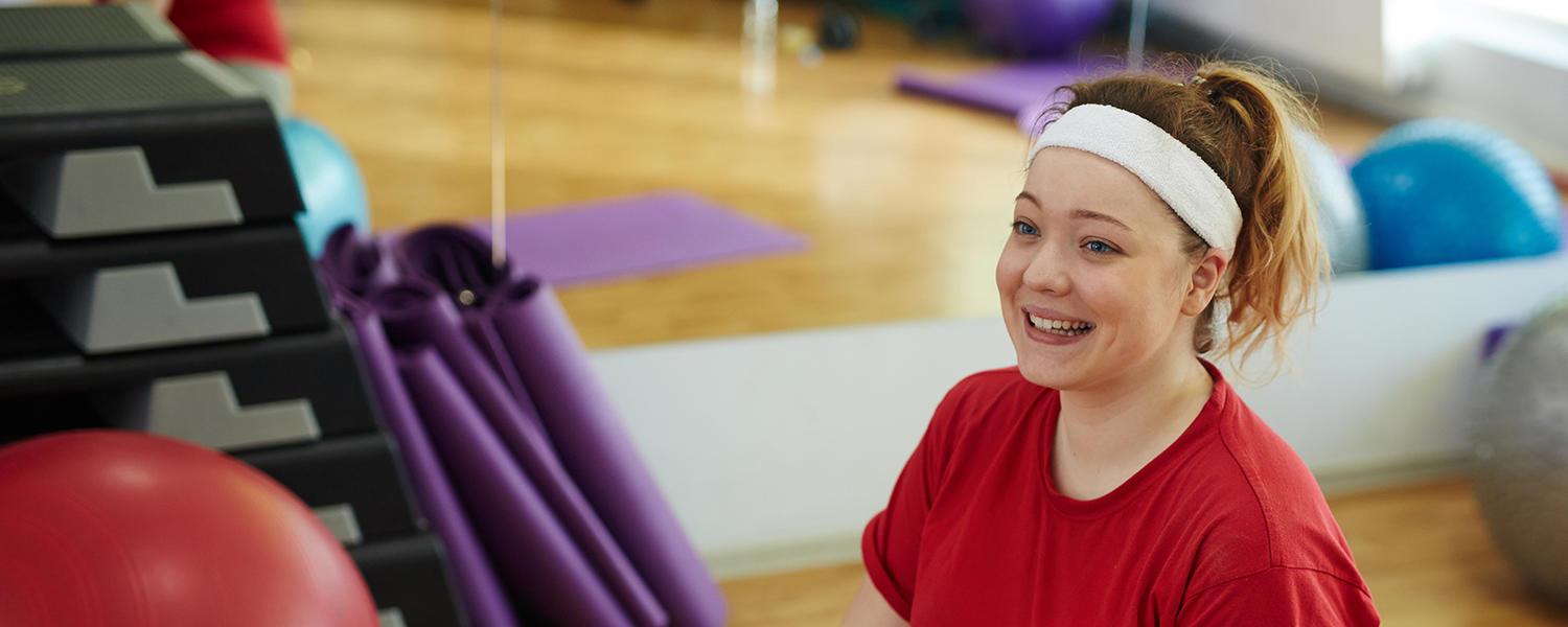 Trymgym woman working out on exercise ball