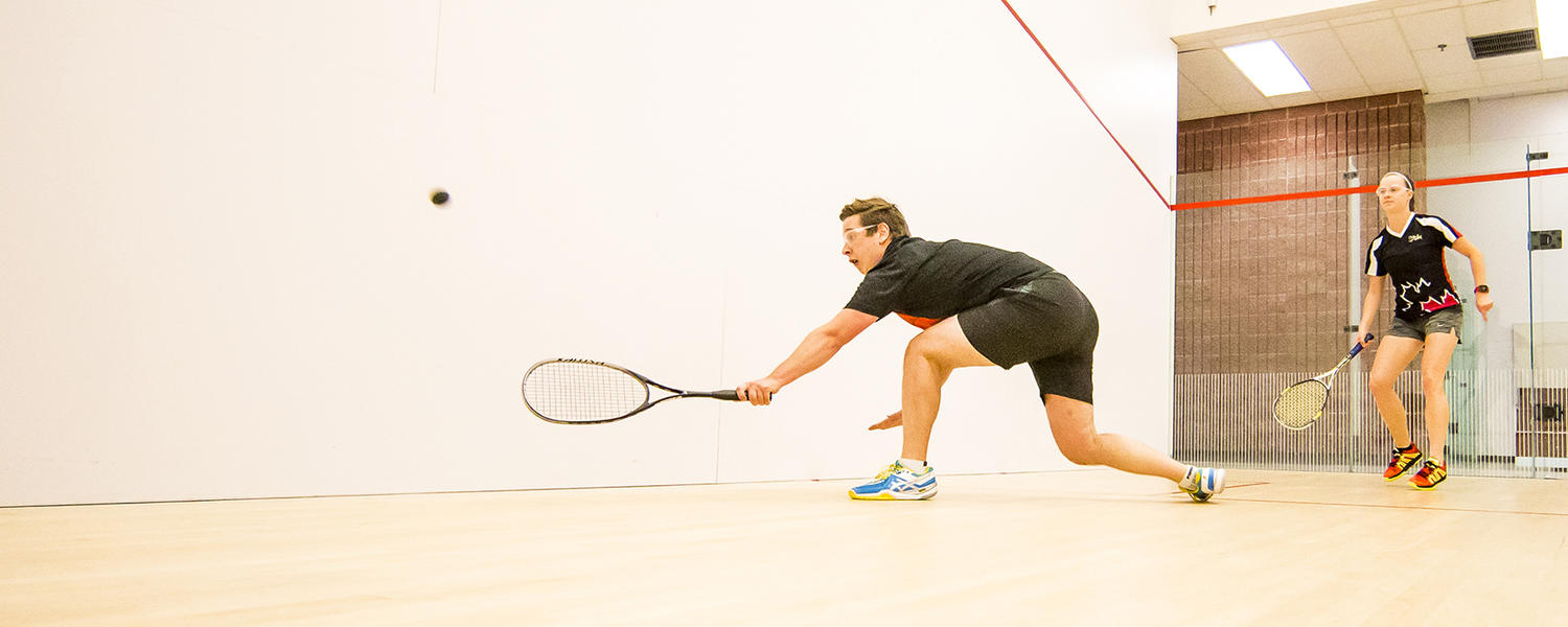 Game of squash in UCalgary courts
