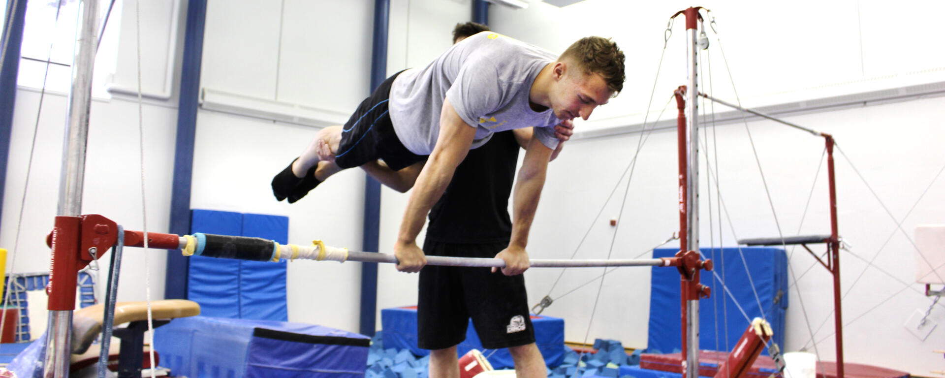 a man doing gymnastics 