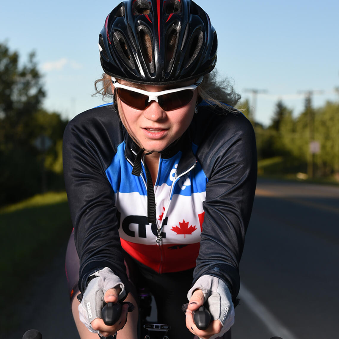 UCalgary triathlon club member cycling
