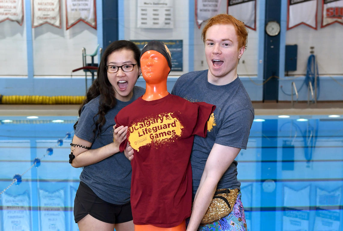 Lifeguards holding a rescue dummy