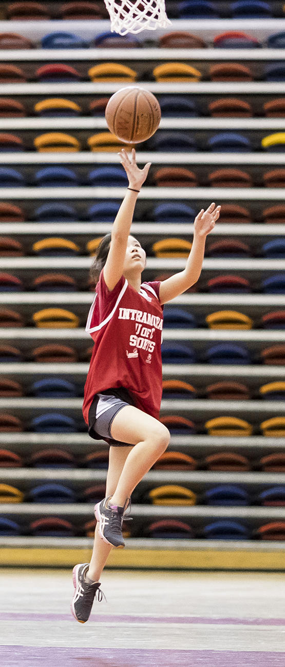 woman playing basketball