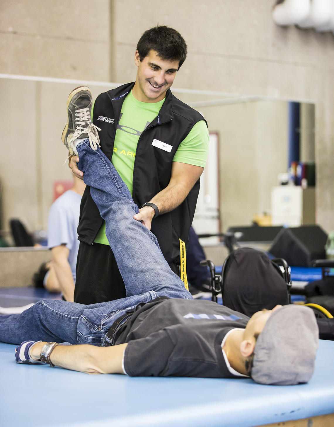 UCalgary Rehab fitness client has his mobility session with trainer