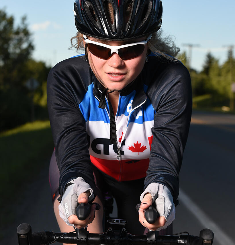 UCalgary triathlon club member cycling