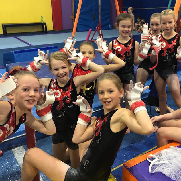 UCalgary Cochrane gymnasts at a competition