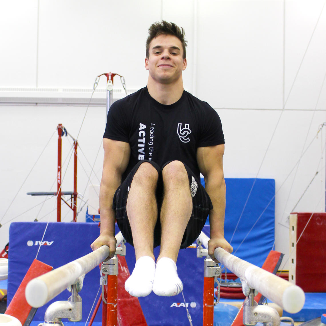 Gymnast on bars
