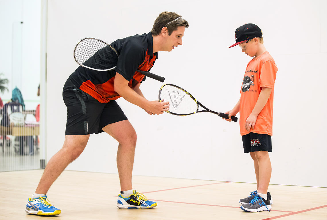 UCalgary Racquet instructor with camps kids
