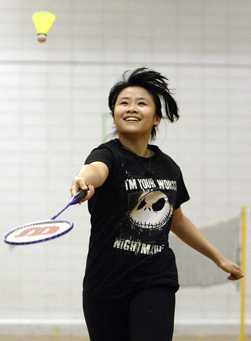girl playing badminton at UCalgary girl playing badminton at UCalgary