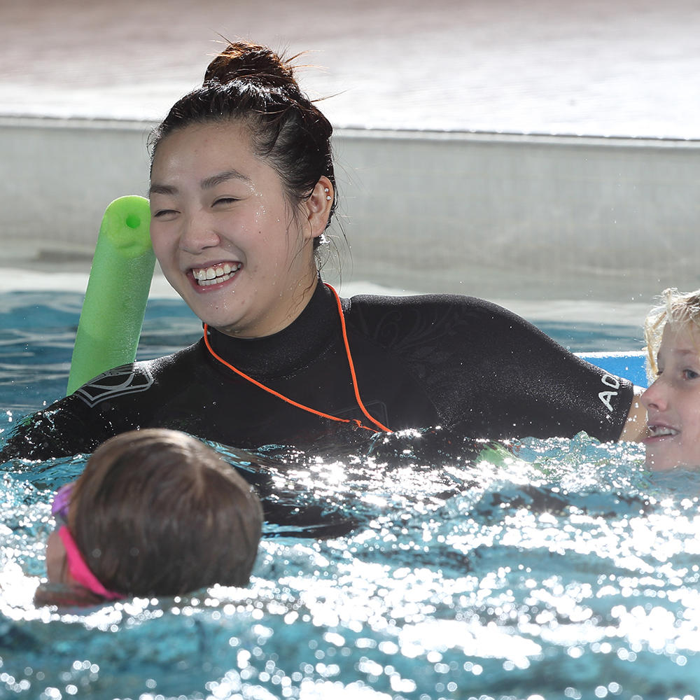 Lifeguard with group of children