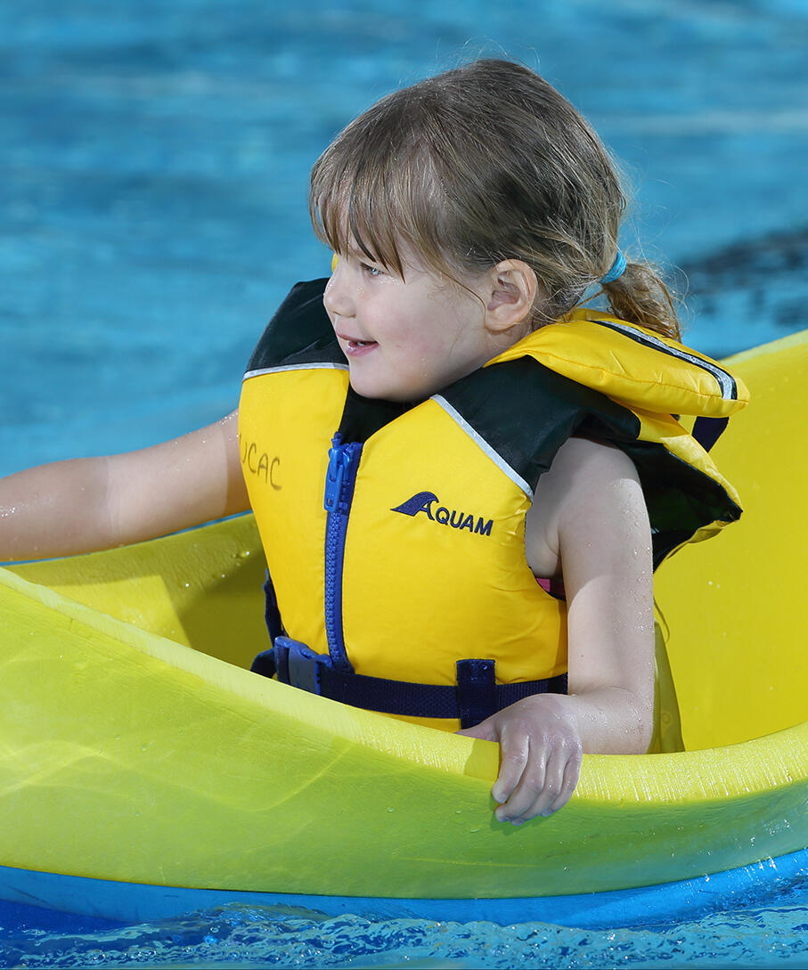 Girl wearing lifejacket in the UCalgary Aquatic Centre