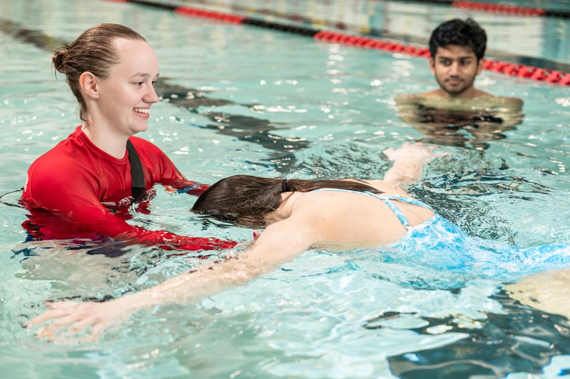 A person learning to swim 