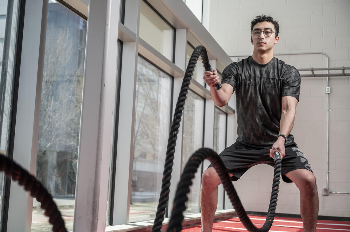 Person working out with ropes