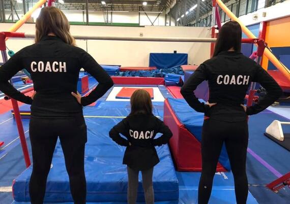 gymnastics coach in training 
