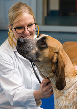 UCalgary vet med student with a dog