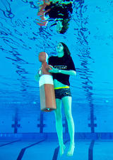 lifeguard practising rescue
